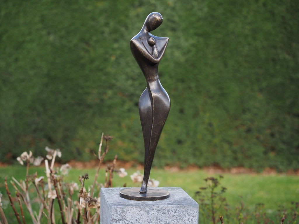 Bronzen beeldje moeder en kind