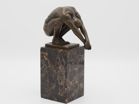 Bronzen beeld zwemmer