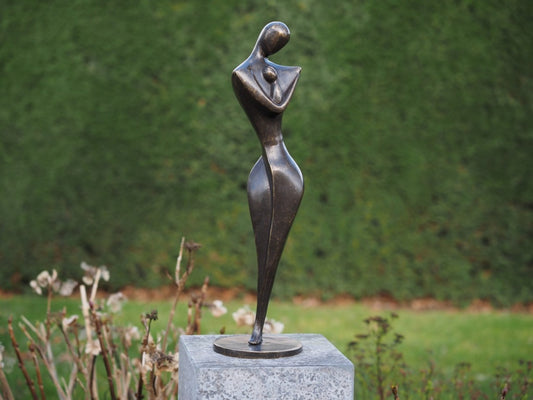 Bronzen beeldje moeder en kind