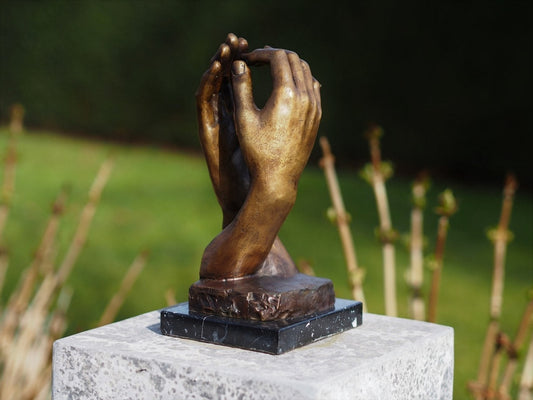 Bronzen beeld handen